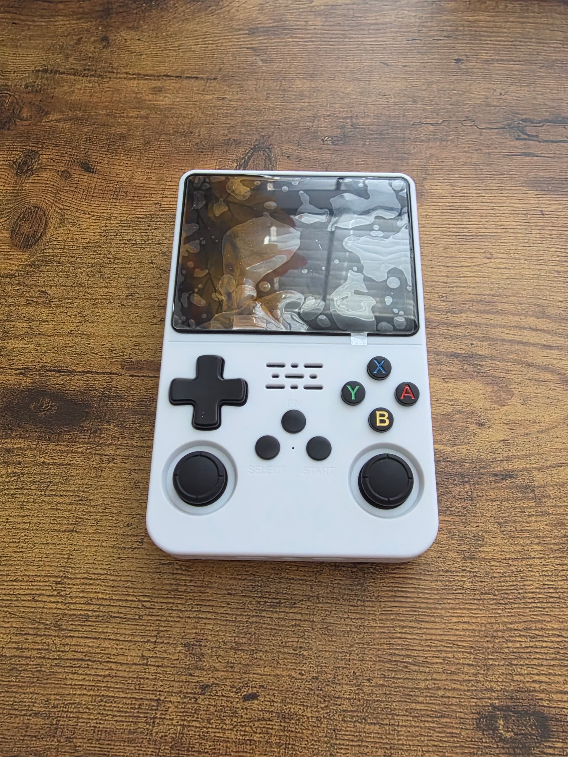 R36S Retro Handheld — front view on desk